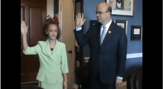 Abby with Congressman McGovern, taking the pledge to end bullying. 